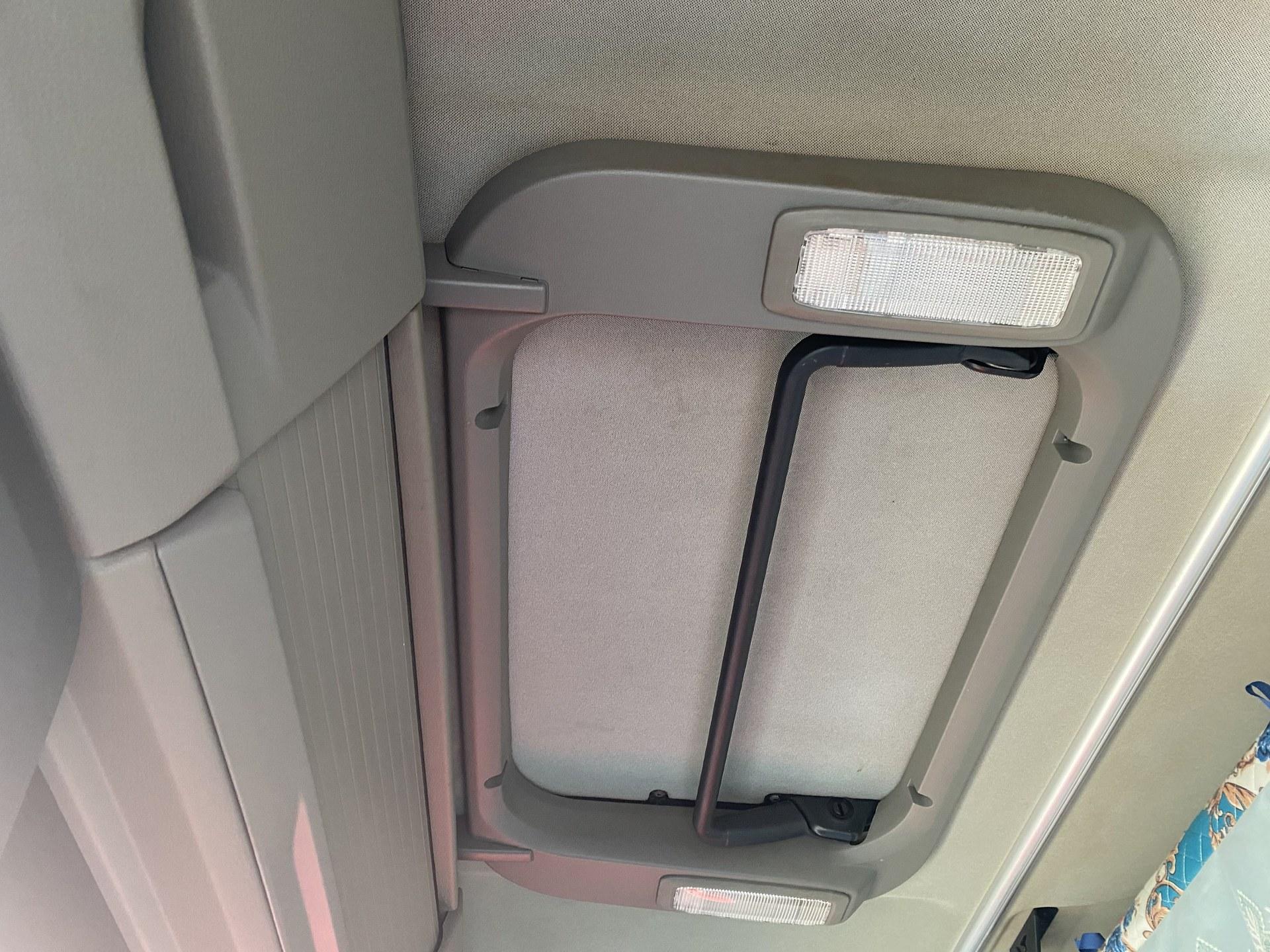 TANAN-MAN-001 — Cab overhead storage